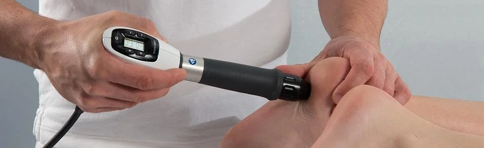 Pressure wave therapy device